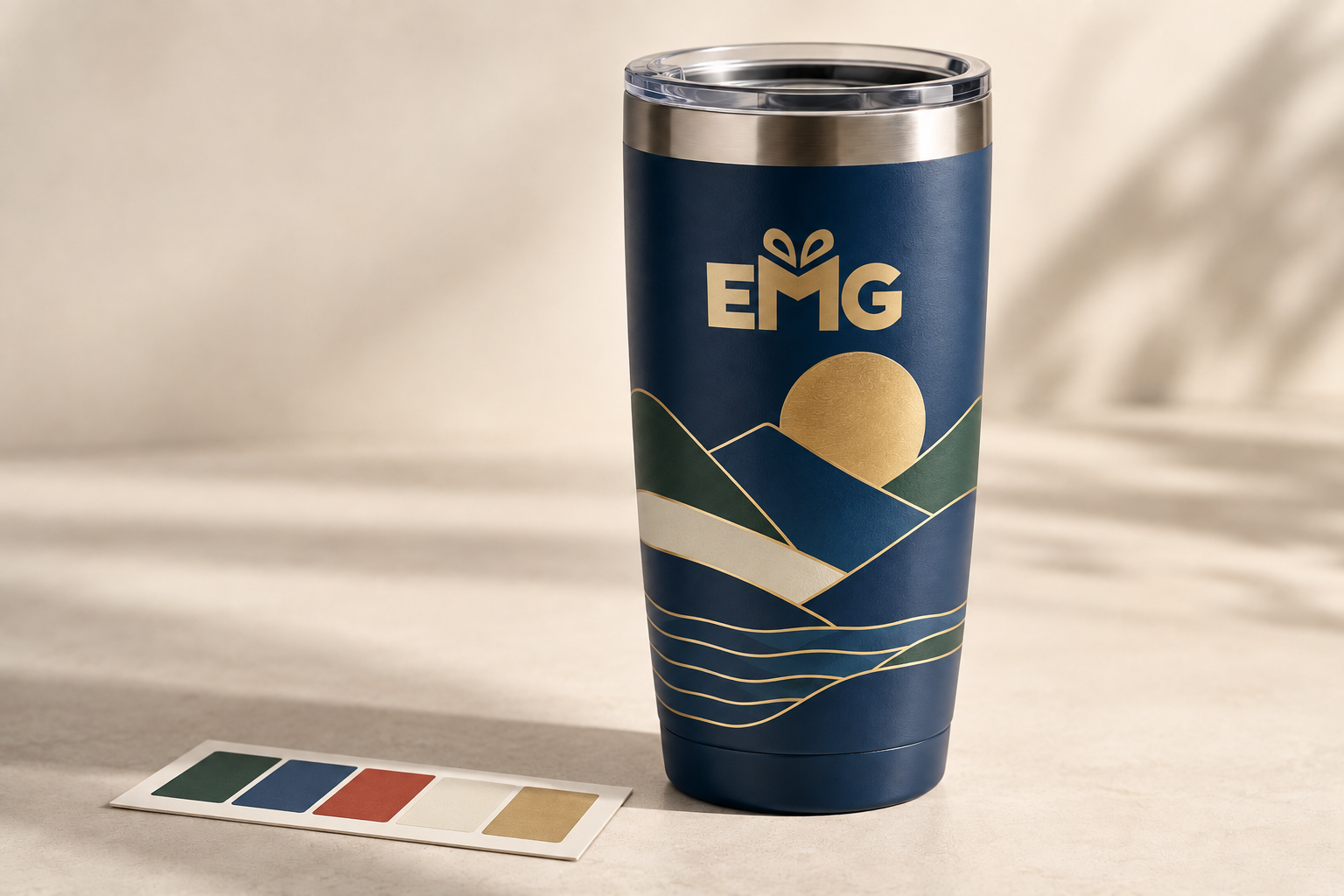 EMG wrap print on a powder-coated tumbler beside a five-color control strip